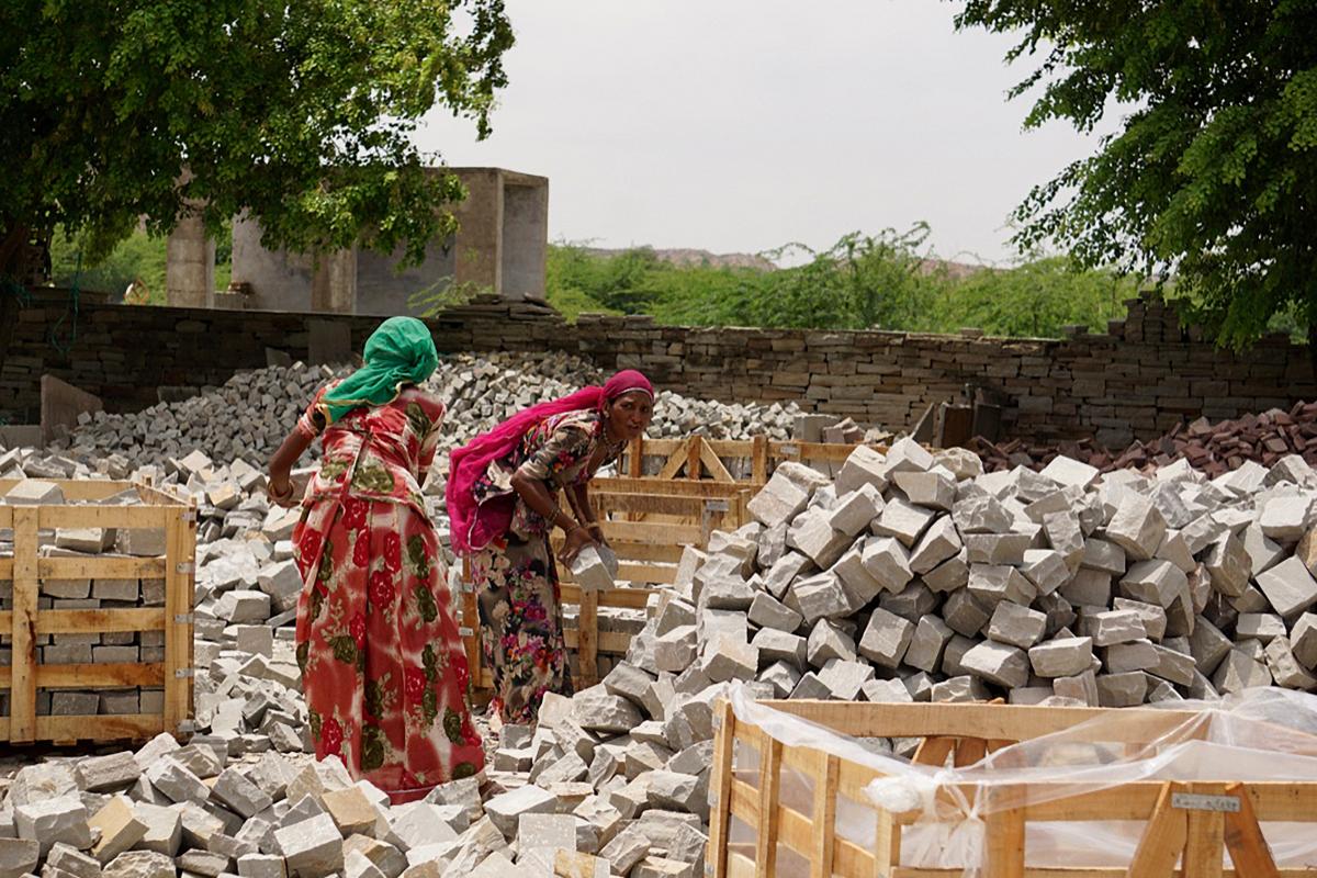 Stacking cobbles in India