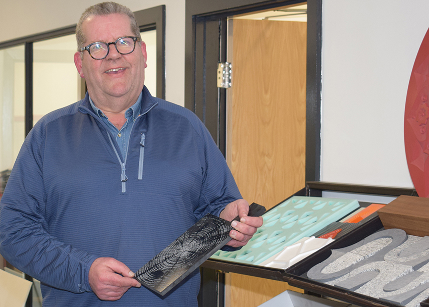 Mathew Haslam hands ownership of Hardscape and IP Surfaces to staff. Mathew Haslam