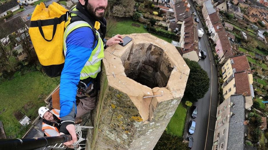 Sally Strachey Director James Preston at the top of the spire