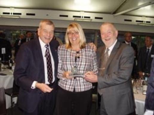 Dickie Bird (left) is presented with a gift of a slate cricket ball and bails by Stone Federation Chief Executive Jane Buxey and President Alex Stable Dickie Bird (left) is presented with a gift of a slate cricket ball and bails by Stone Federation Chief Executive Jane Buxey and President Alex Stable