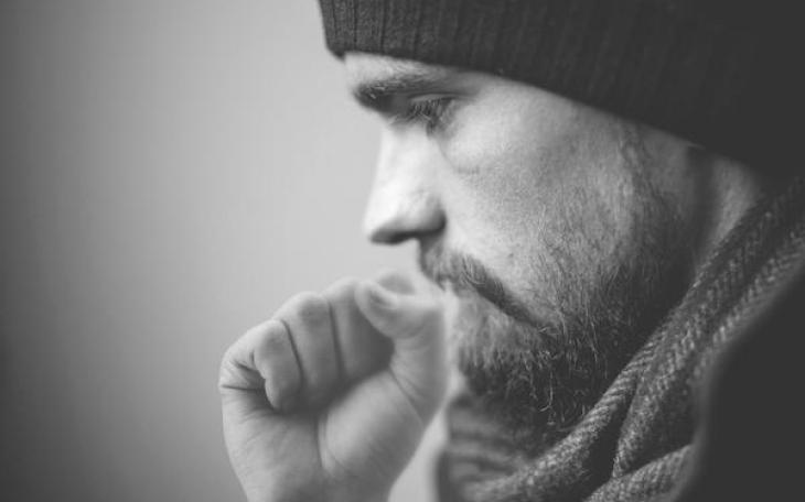 Man coughing