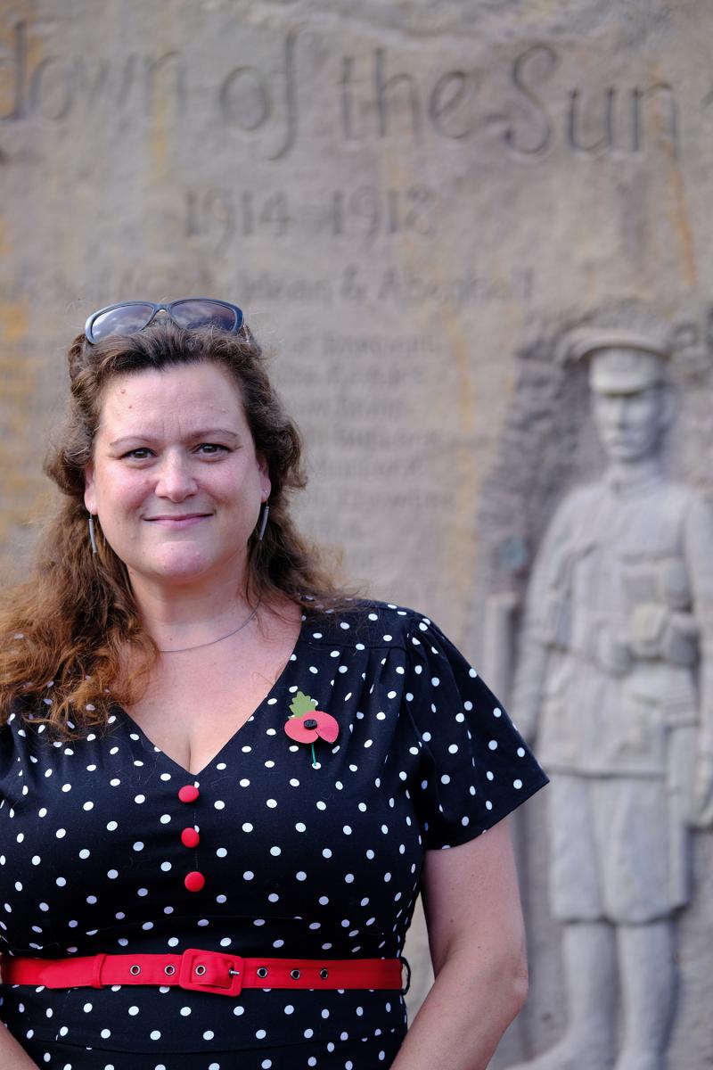 Carrie Horwood in front of the memorial